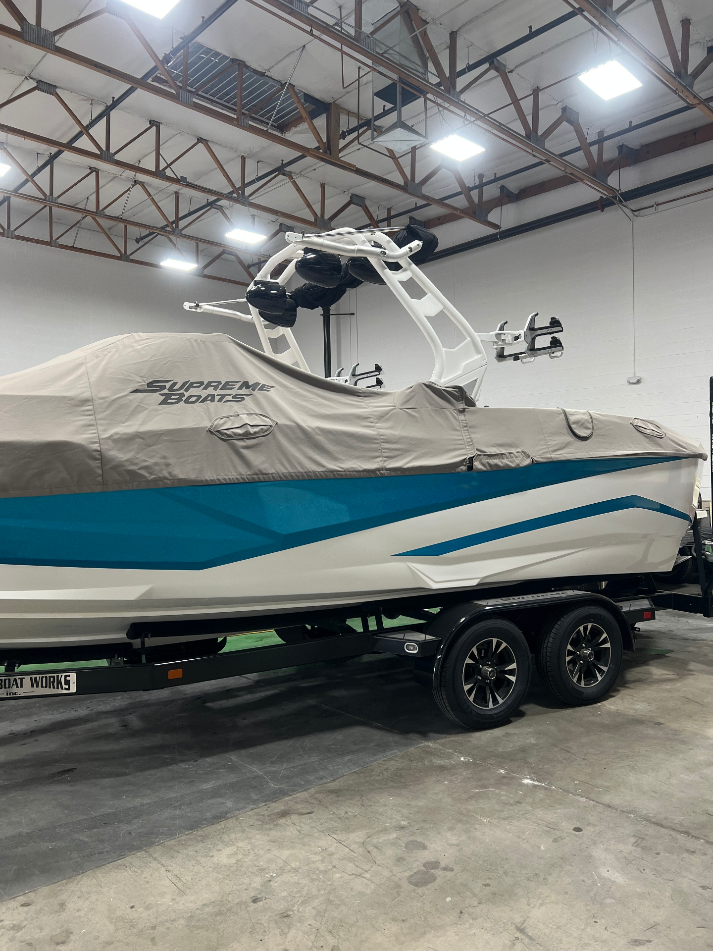 Supreme wakeboard boat trailer serviced in storage facility
